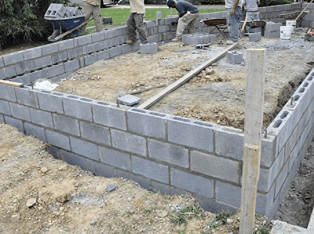 Professionals building a foundation with blocks in Rockford, IL