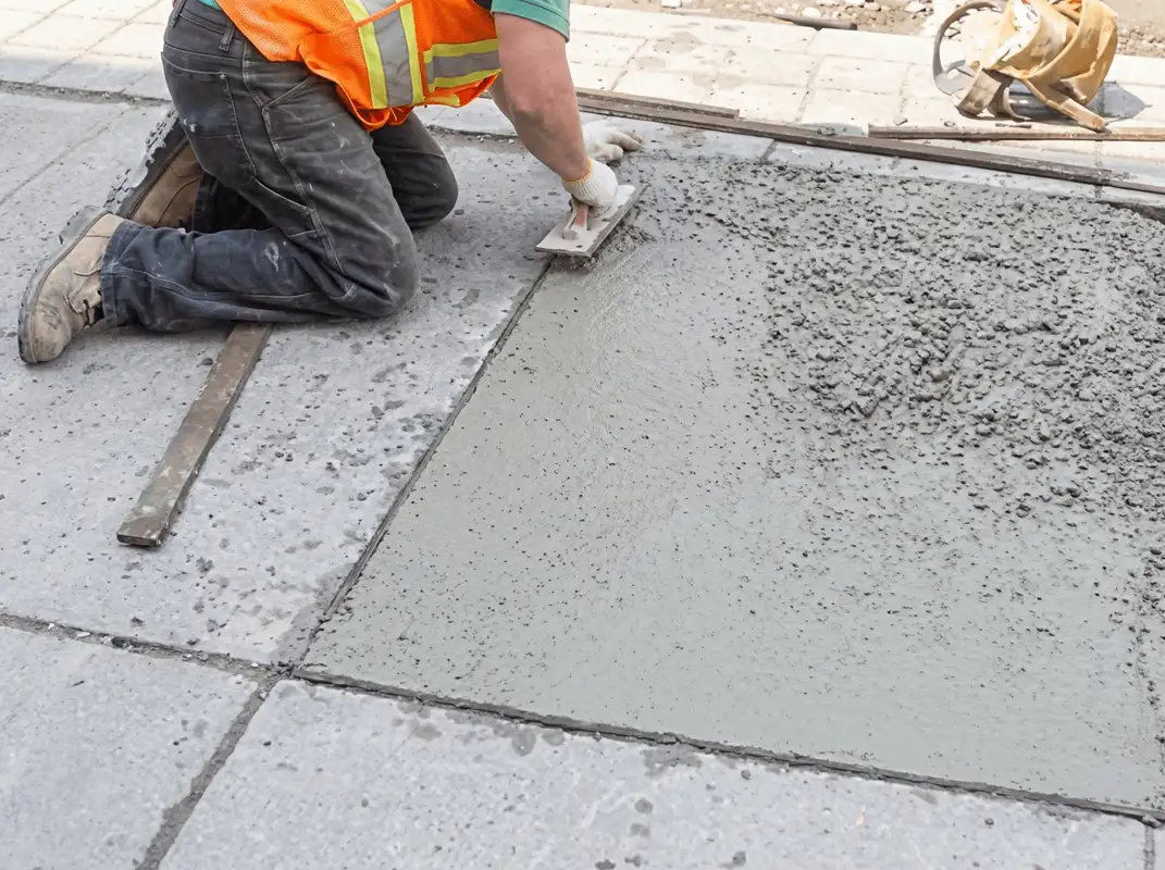 Professional repairing a concrete floor in Rockford, IL