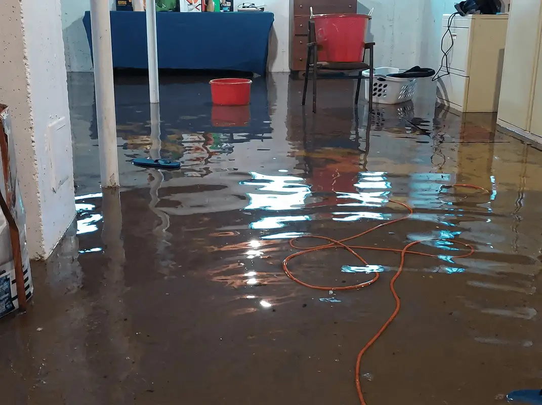 Basement with boiler, cabinets and washing machine completely flooded in Rockford, IL