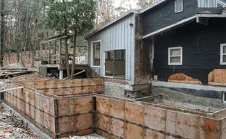 Prepared site with foundation forms for home remodeling and addition project in Rockford, IL