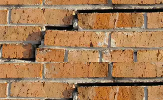 Brick wall with serious structural damage in Rockford, IL